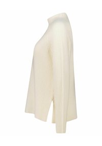 Gerippter Rollkragenpullover in Cremefarbe. Verfügt über einen geraden Schnitt, Seitenschlitze und einen strukturierten Stoff für einen angenehmen Tragekomfort.