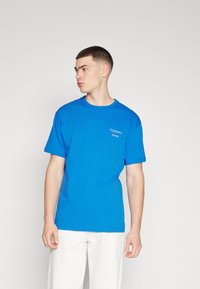 Tommy Jeans Camiseta básica - persian blue