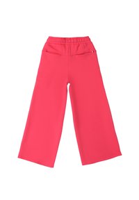 Wijde broek in felroze, met een elastische tailleband, twee achterzakken en een gladde, zachte textuur. Ontworpen voor comfort en gemak.