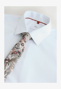 Wybrany, white rust orange floral