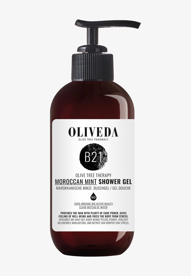 Bouteille de pompe en plastique marron étiquetée "Gel Douche à la Menthe Marocaine". Présente un dessus de pompe noir et une étiquette blanche avec du texte noir.