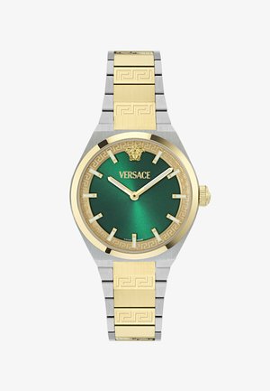 Orologio da polso Versace in oro e argento con quadrante verde, indicatori delle ore in oro, emblema Medusa e bracciale metallico decorato.