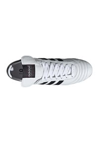 White leather sneaker with black three stripes, a padded tongue, and textured detailing on the toe and sides. Features a logo label on the tongue.
