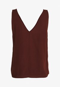 Rdzawoczerwony bezrękawnik z głębokim dekoltem w kształcie V. Wykonany z miękkiego materiału, charakteryzujący się luźnym krojem i prostym wykończeniem.