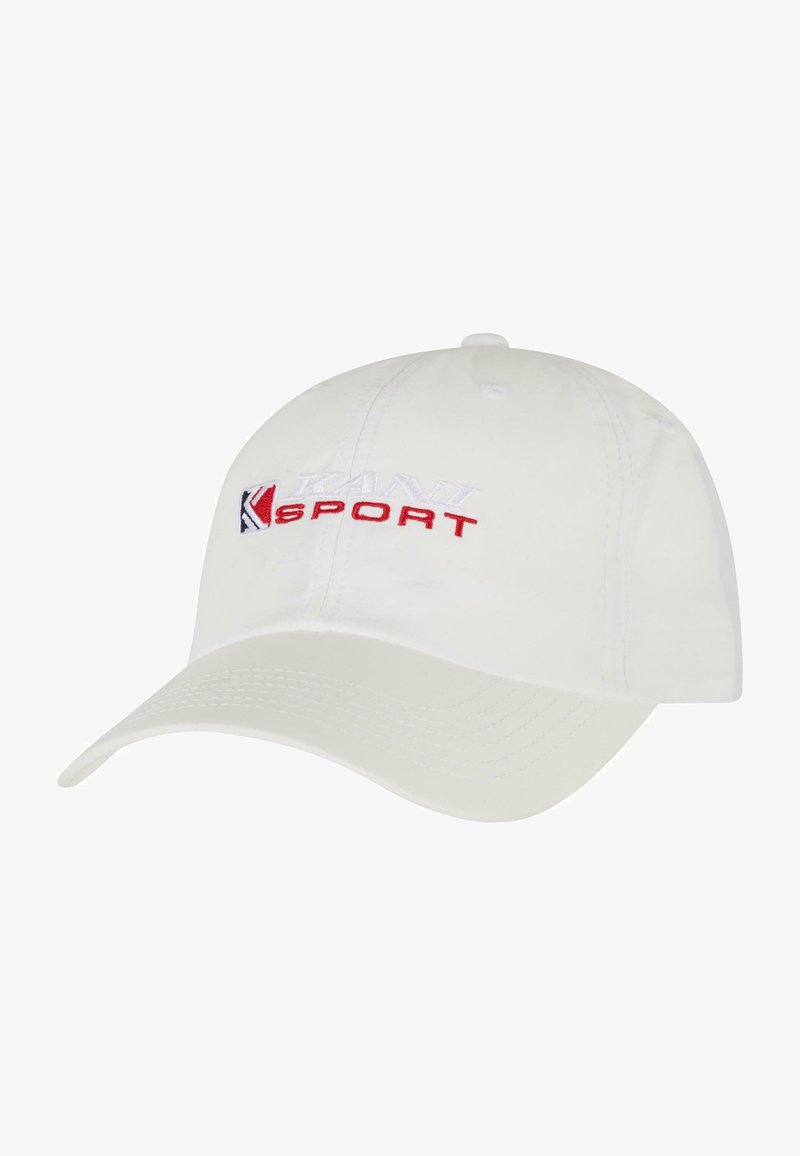 Valge pesapalli kork kõverate äärega. Ees on tikitud "KANI SPORT" logo punase ja sinise värviga. Valmistatud siledast kangast, ilma õmblusteta disain.