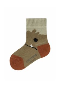 Stricksocke für Kinder mit einem hellbraunen und olivgrünen Muster, das ein Cartoon-Tiergesicht zeigt, schwarzen Akzenten sowie orangefarbenen Fersen- und Zehenbereichen.