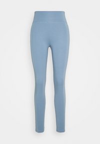 Leggings blu con vita alta, realizzati in un tessuto elastico. Presentano un design senza cuciture e cuciture a contrasto lungo i lati.