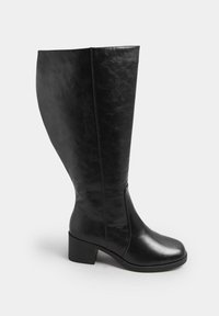 Svarta knälånga stövlar i syntetläder, med rundad tå och klack, med en slät yta och minimala sömdetaljer.