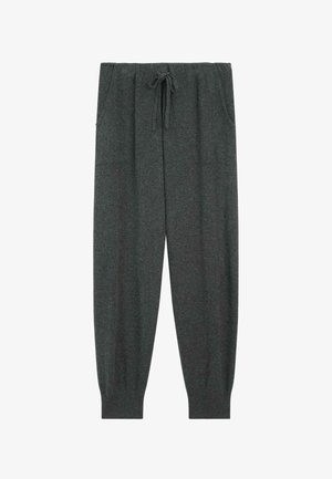 Mørkegrå sweatpants med elastisk talje og snor, sidelommer og ribbede manchetter ved anklerne.