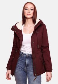 Burgundy winter jacket with a faux fur-lined hood, zip closure, and multiple pockets. Made from durable fabric with ribbed cuffs.