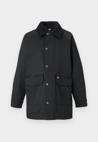 Veste noire mi-longue avec fermeture par boutons, deux grandes poches à rabat et un col doux.