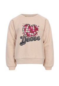 Beige sweatshirt met een roze en rode geblokte hart boven het woord "Dance" en de zin "You make me want to" in een boog boven het hart.