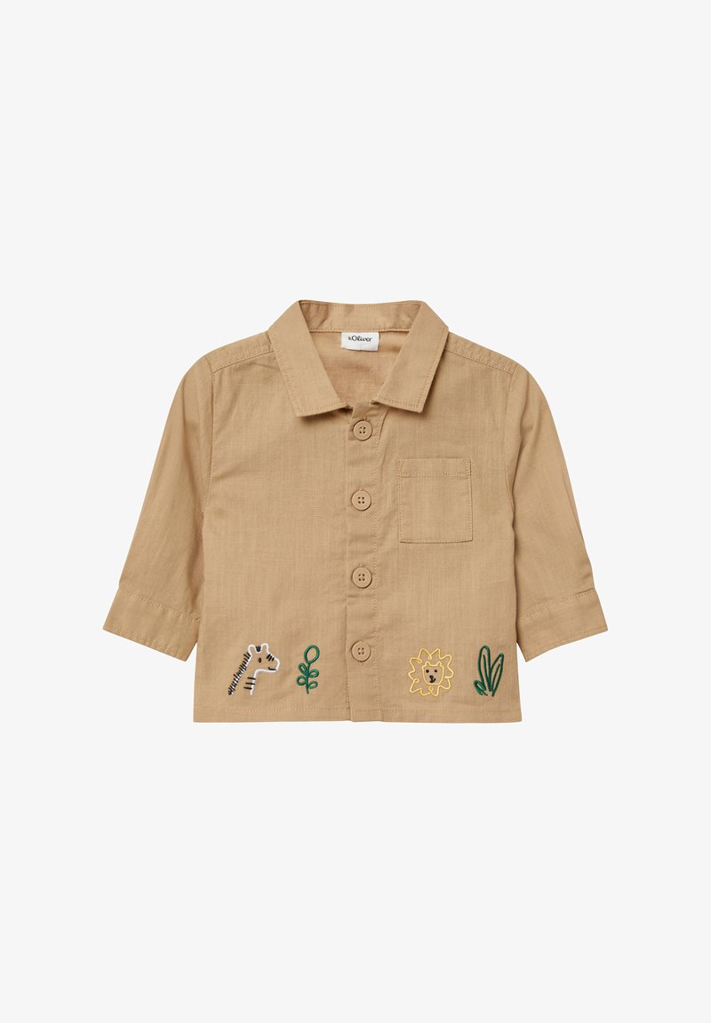 Beige Baumwollhemd mit langen Ärmeln und Knopfverschluss. Ausgestattet mit einer gestickten Zebr, einem Löwen, Pflanzen und einer Brusttasche. Schwarze Knöpfe, lässiges Design.