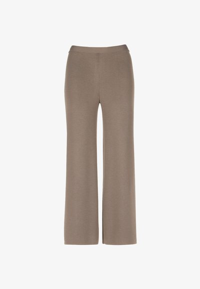 Stiepjami, platajiem biksēm gaiši taupe krāsā. Gluda tekstūra ar vidēju jostas augstumu. Nav redzamu šuvju vai kabatu.