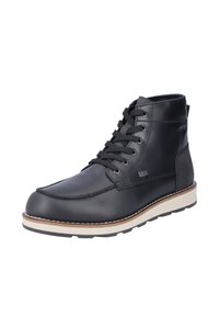 Bottines en cuir noir avec un bout rond, des lacets noirs et une semelle blanche contrastante. Présentent des détails de couture et un accent de marque.