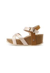 Sandali con zeppa in pelle beige e marrone con cinturini incrociati e fibbia regolabile alla caviglia. Suola in sughero testurizzato per una maggiore aderenza.