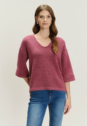 - Sweter