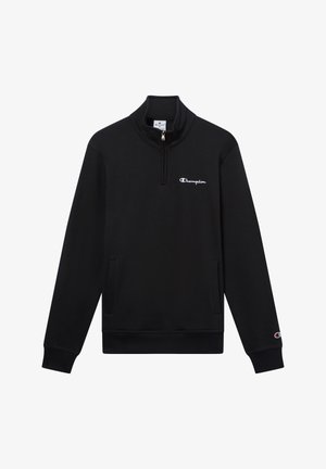 Sweat-shirt zippé noir en coton. Il dispose d'un col montant, de manches longues, de poches avant et d'un petit logo blanc sur la poitrine.
