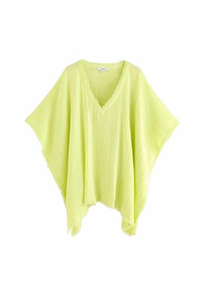 Poncho vert clair à texture, avec un col en V et des manches amples. Il présente un ourlet à franges et un tissu léger. Coupe décontractée et confortable.