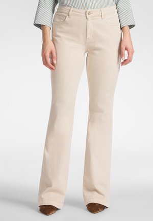 FLARE - Flared Jeans - beige