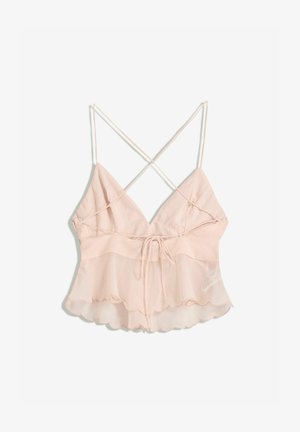 Camisole rose clair avec des bretelles spaghetti réglables, un buste ajusté et un ourlet évasé présentant un bord festonné et un détail de lien.