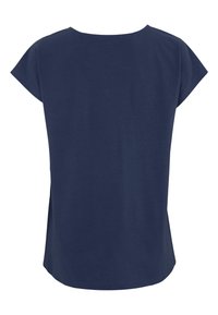 Merin sininen, lyhythihainen paita, jossa on pyöreä pääntie. Pehmeä kangas, rento istuvuus ja lievästi korkea-alareuna, joka tarjoaa lisää liikkuvuutta.