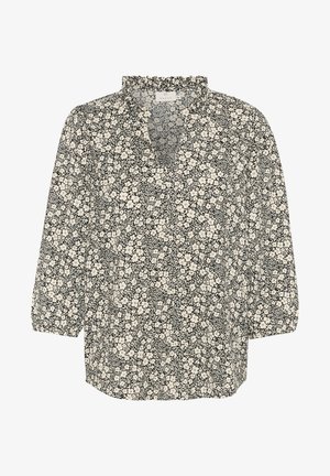 Crno-bijela cvjetna bluzica s dubokim V-izrezom, volanastim ovratnikom i rukavima do tri četvrtine. Ima mali uzorak cvjetova po cijeloj površini.