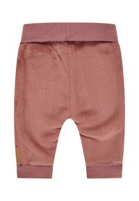 Weiche, staubige babyfarbene Hosen in Rosa mit elastischem Bund und Bündchen, aus plüschigem Material, von hinten gezeigt.