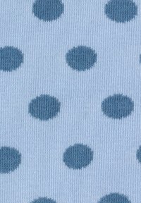 Light blue knitted fabric with evenly spaced dark blue polka dots forming a regular pattern.
