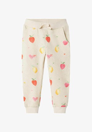 Børns joggingbukser i lysebeige stof med frugt mønstre, som inkluderer jordbær og citroner. Inkluderer en elastisk talje og lommer.