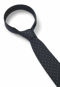 Cravatta blu navy con pois bianchi, realizzata in tessuto liscio, caratterizzata da una forma classica e un nodo al centro, adatta per occasioni formali.