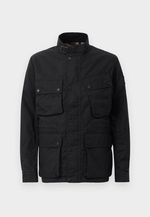 Black jacket made of durable material, featuring a high collar, multiple front pockets, snap buttons, and a plain design.