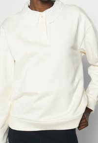 Claudie Pierlot Mikina - off-white