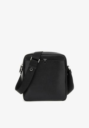 Zwarte rechthoekige crossbodytas met verstelbare brede band en klein driehoekig Guess-logo aan de voorkant in het midden.