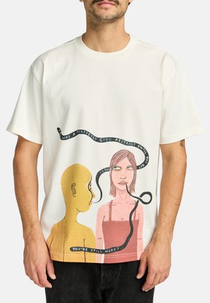White cotton t-shirt featuring a graphic print of two figures, one yellow and one pink, with black text and a snake-like design.