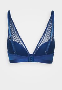 Triumph Aura Spotlight Triangel Bh Blue Sapphire Blau Zalando De