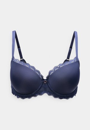 Sutien albastru marin cu cupe netede, căptușite și marginile din dantelă. Dispune de bretele reglabile și un detaliu decorativ în centrul frontal cu un mic inel.