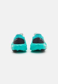 New Balance FUELCELL REBEL V4 - Road running shoes - green