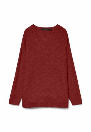 Punane soonikkoes kampsun pikkade varrukatega, V-kaelusega ja lõdva lõikega. Alumises servas külgedel lõhikud, mis lisavad mugavust.