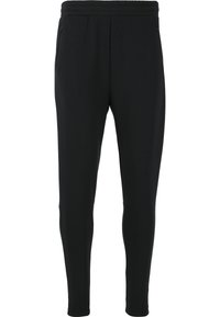 Sorte joggebukser lavet af blødt, strækbart materiale. Har en elastisk talje, to sidelommer og et tætsiddende ben design.