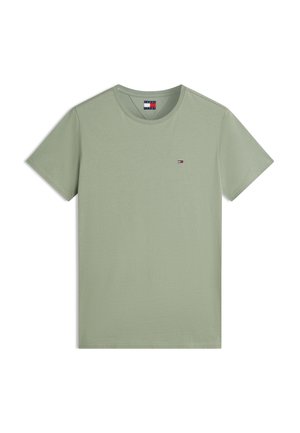 Világoszöld, kerek nyakú, rövid ujjú póló apró Tommy Hilfiger logóval a mellkason és márkás címkével a nyak belsejében.