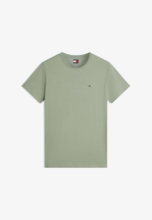 Világoszöld, kerek nyakú, rövid ujjú póló apró Tommy Hilfiger logóval a mellkason és márkás címkével a nyak belsejében.
