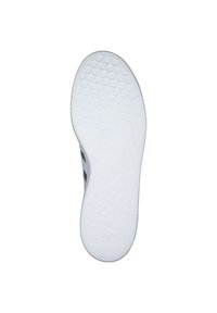 Witte sneakerzool met een textuur, een hexagonaal patroon en een lichte kromming; heeft een logo nabij de teen.