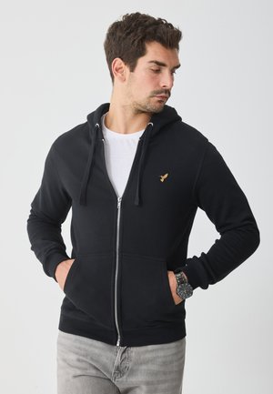 Felpa con zip - true black