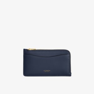 Navyblauer Leder-Kartenhalter mit goldenem Reißverschluss und dem in Gold geprägten „Coach New York“-Logo auf der Vorderseite.