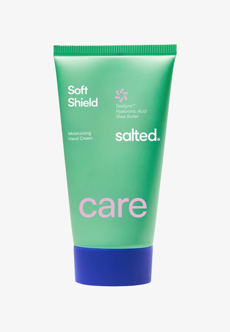 Grøn tube med Soft Shield fugtgivende håndcreme med SeaSync, hyaluronsyre og sheasmør, blå hætte.