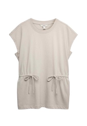 Beige kortærmet skjorte med rund halsudskæring og justerbare bindebånd ved taljen, lavet af blødt stof.