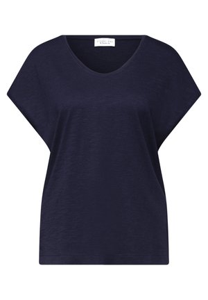 Top blu navy a maniche corte, vestibilità ampia con scollatura a V e texture minimale, etichetta "Street One Studio" all'interno del colletto.