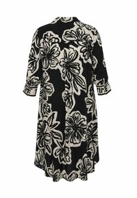 Zwarte en crèmekleurige bloemen tuniekjurk met driekwart mouwen, lichtgewicht stof, een losse pasvorm en een ronde zoom. Zwart bloemmotief over de gehele jurk.