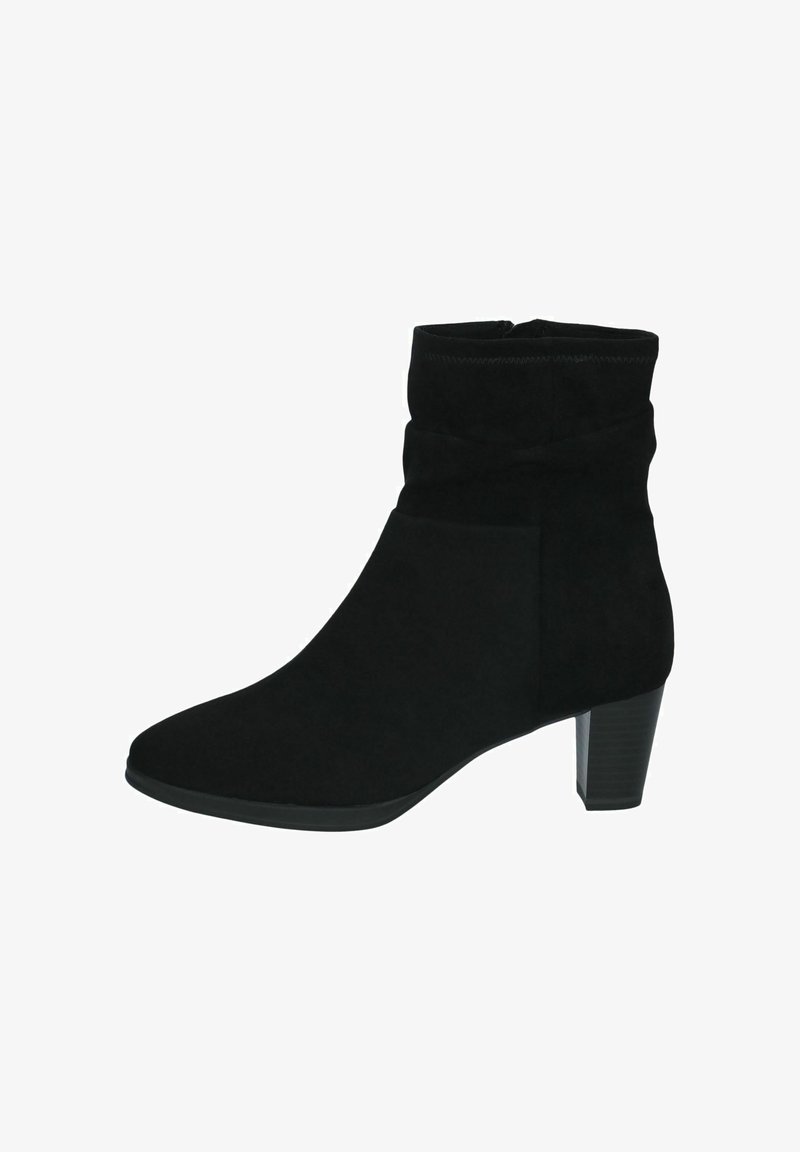 Bottine en suède noire avec un talon bloc empilé et un dessus décontracté, adaptée pour une tenue casual ou habillée.